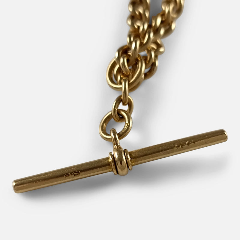 the 18ct gold t-bar in focus