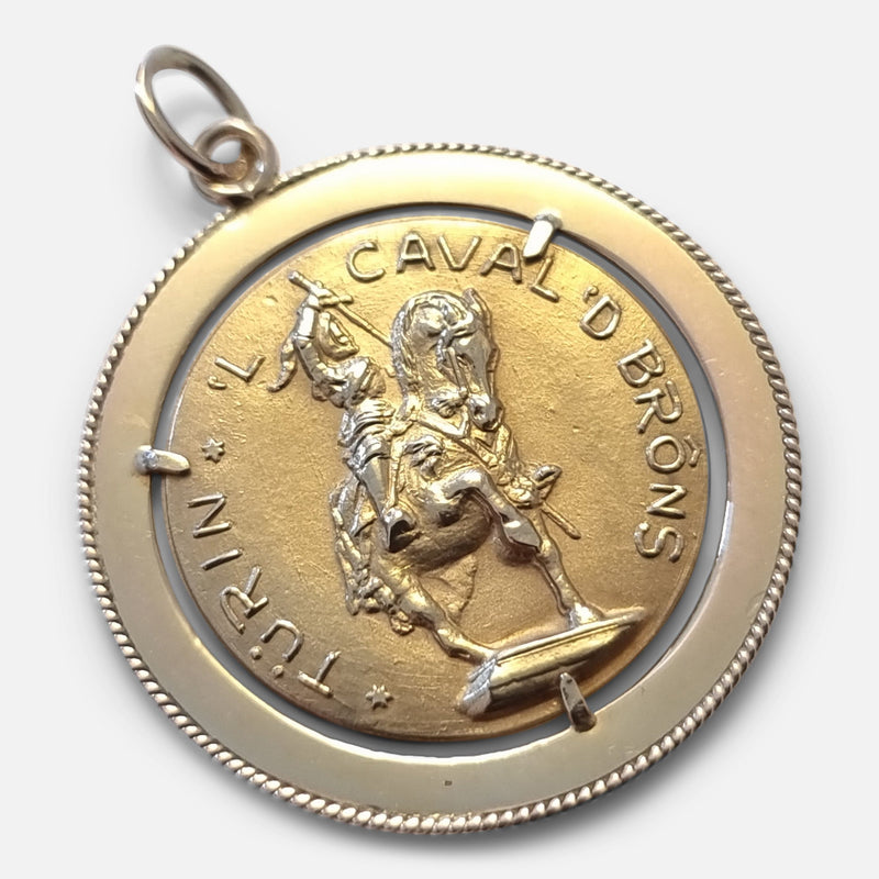 the gold pendant medallion viewed diagonally