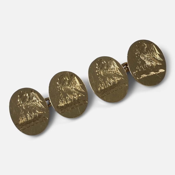 the pair of cufflinks viewed diagonally