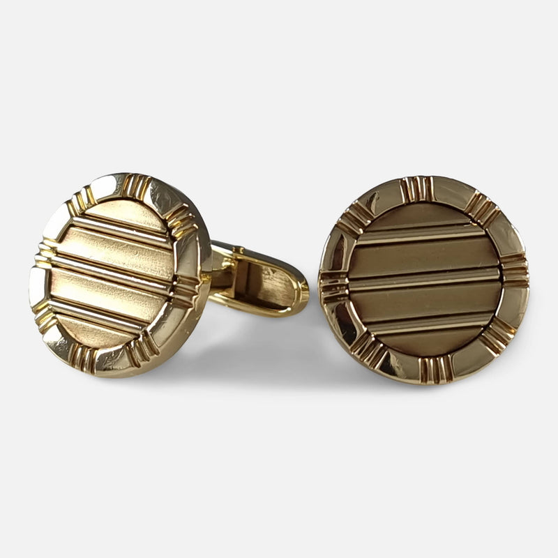 the pair of 18ct yellow gold cufflinks by Asprey with plaques to the forefront