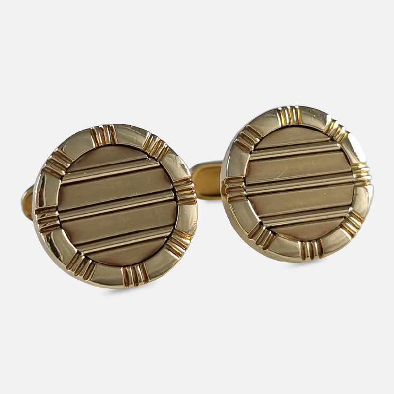 the pair of cufflinks viewed at a slight angle