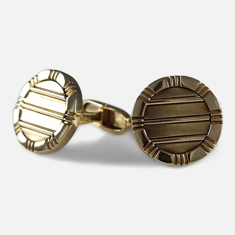 a view of the cufflinks with one facing forward and the other facing slightly away