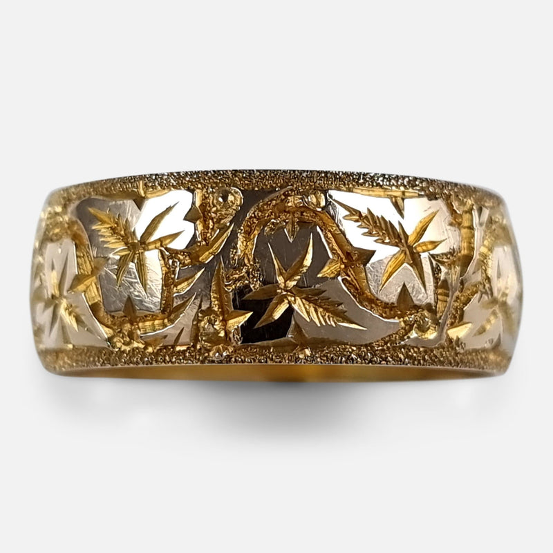 the engraved gold band viewed from the front