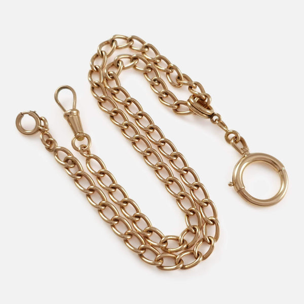 the French 18ct Rose Gold Curb-Link Albert Watch Chain in focus