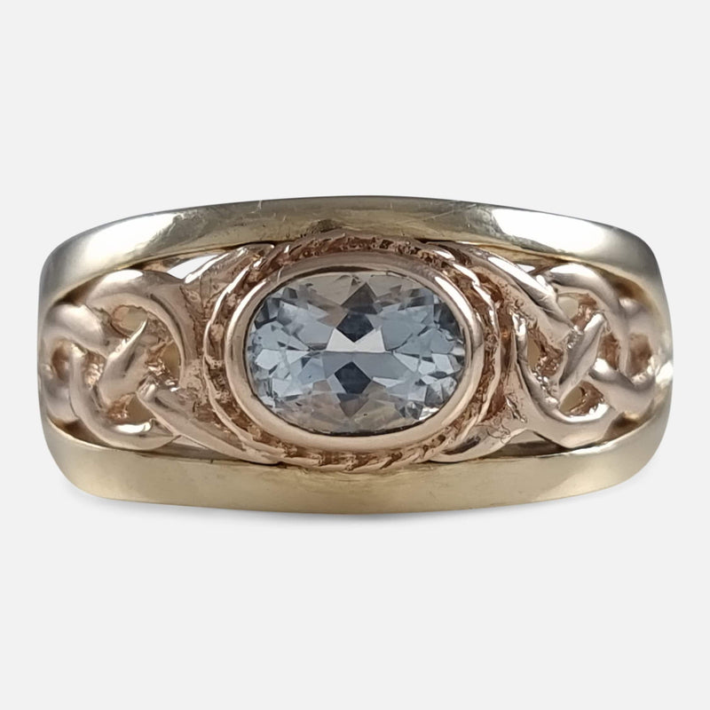 the 9ct gold aquamarine Celtic style ring by Clogau, viewed from the front