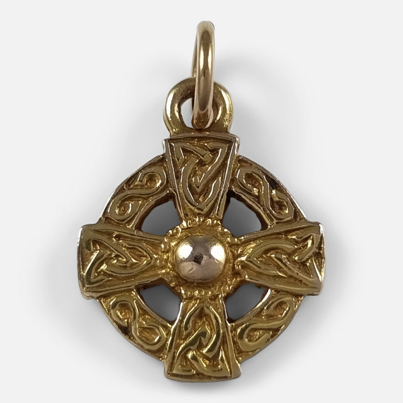 a birds eye view of the gold pendant