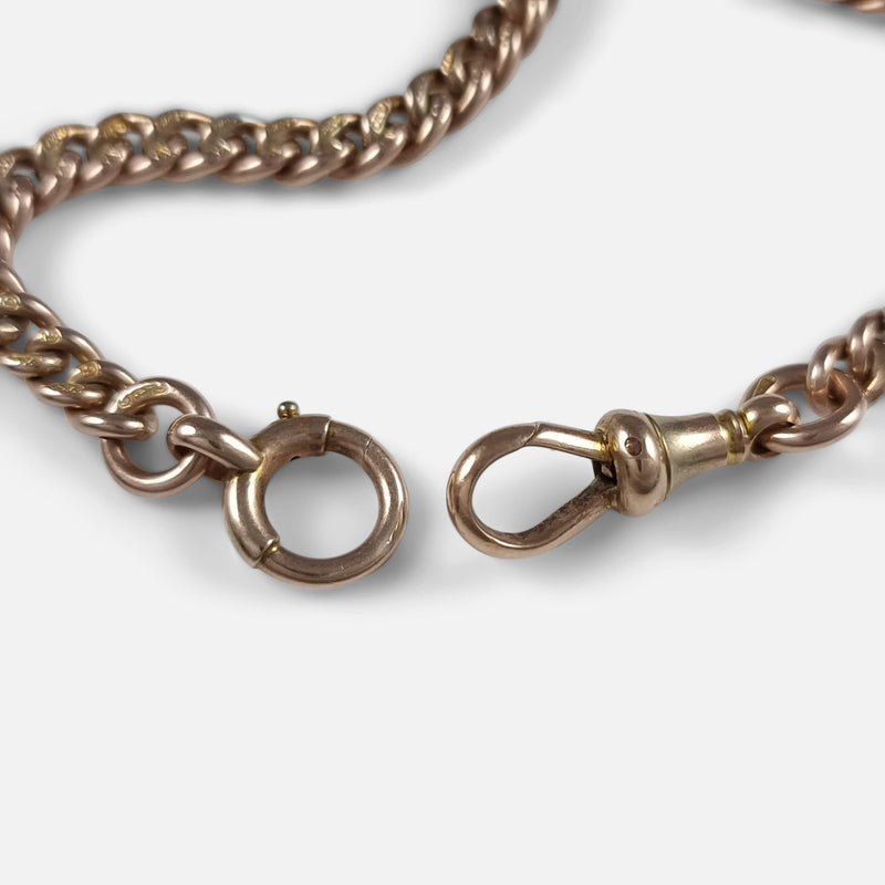 focused on the dog clip and roll pin clasp