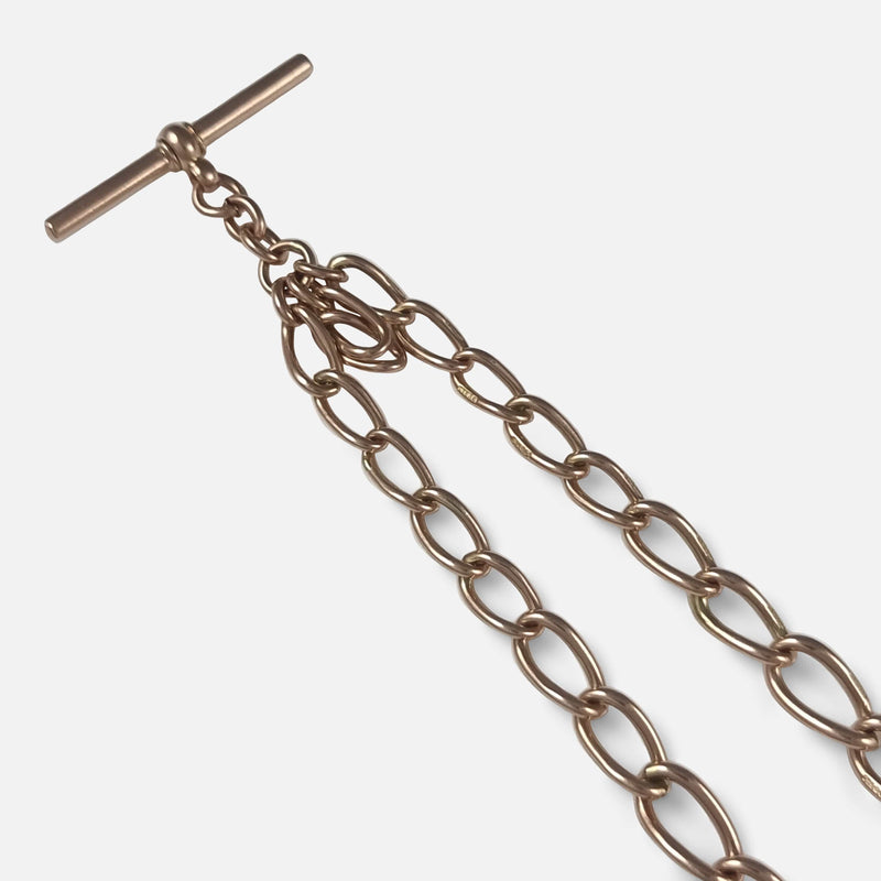 focused on a section of the chain links to include the T-bar