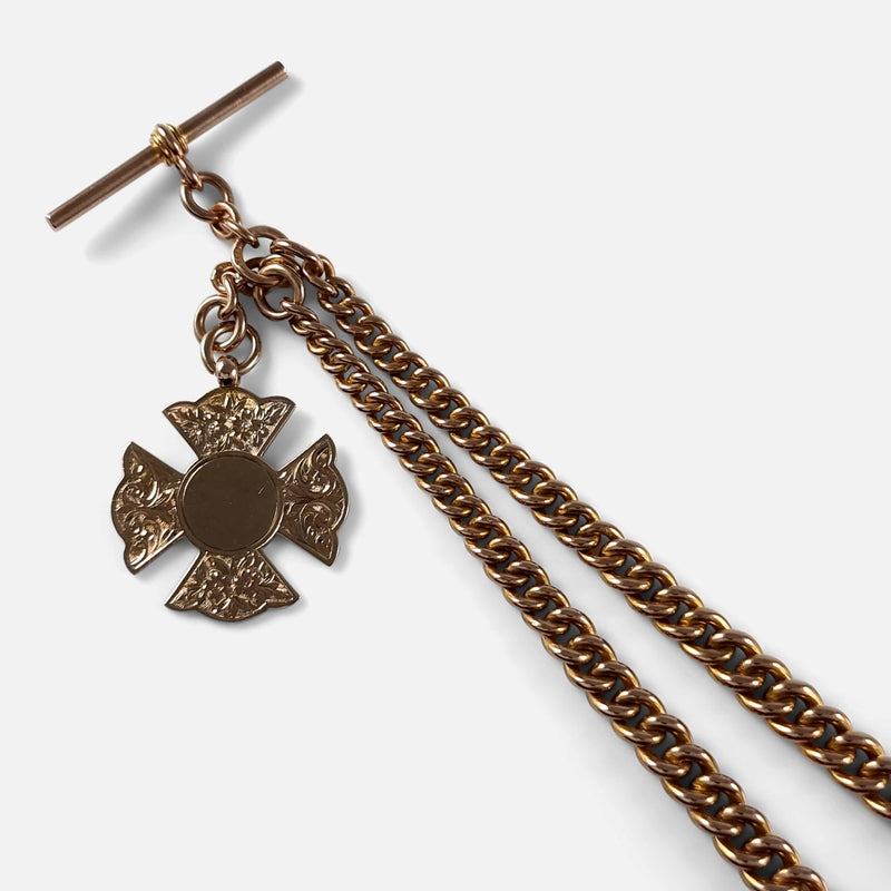 a section of the chain with T-bar and fob in focus