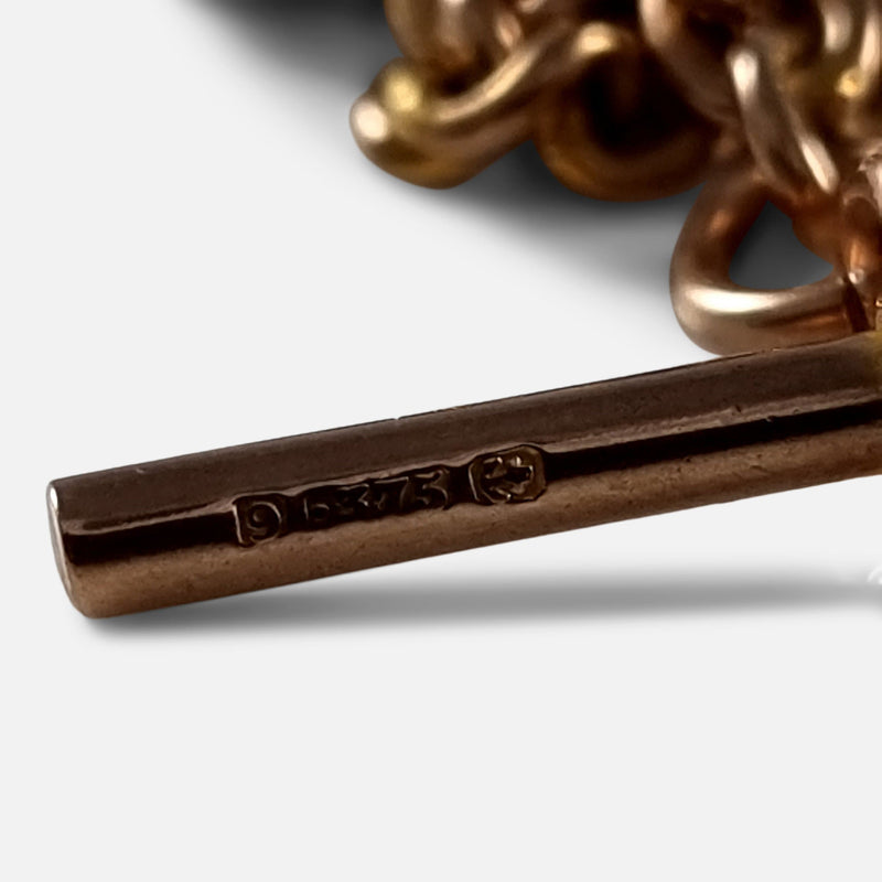 the gold fineness mark to the T-bar