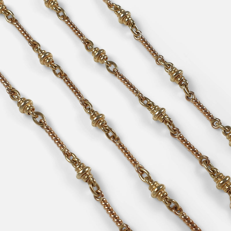 a section of the gold chain in focus