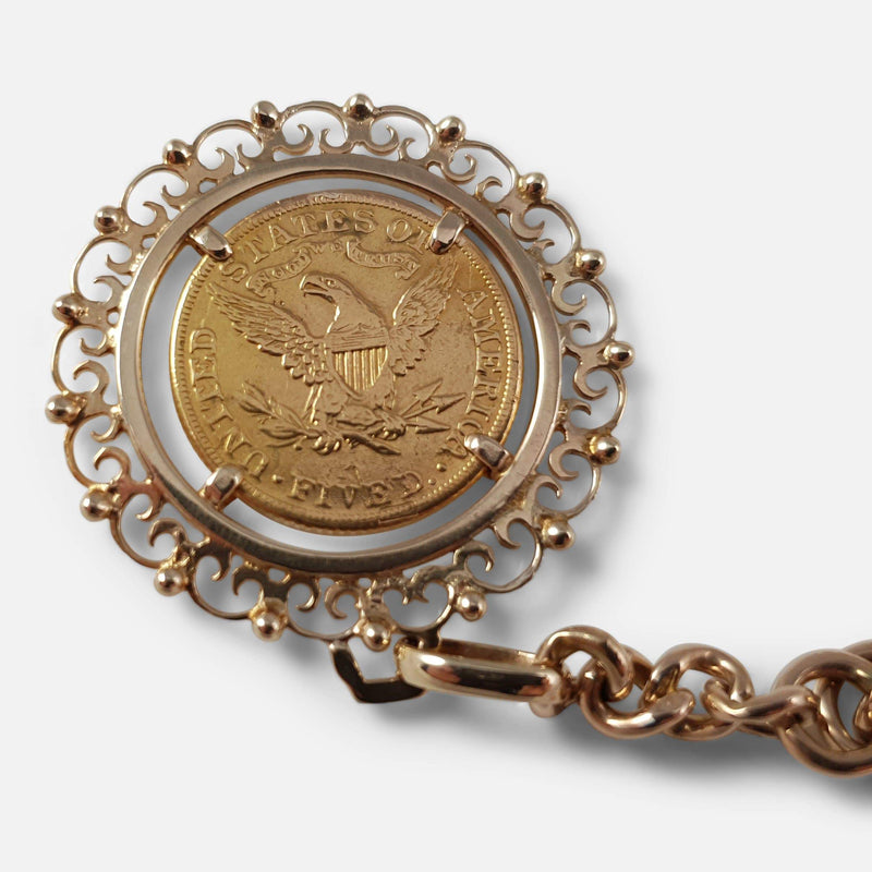 a view of the 1881 $5 Gold Coin in its mount