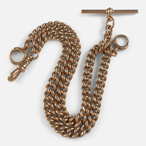the antique 9ct yellow gold double albert watch chain in focus