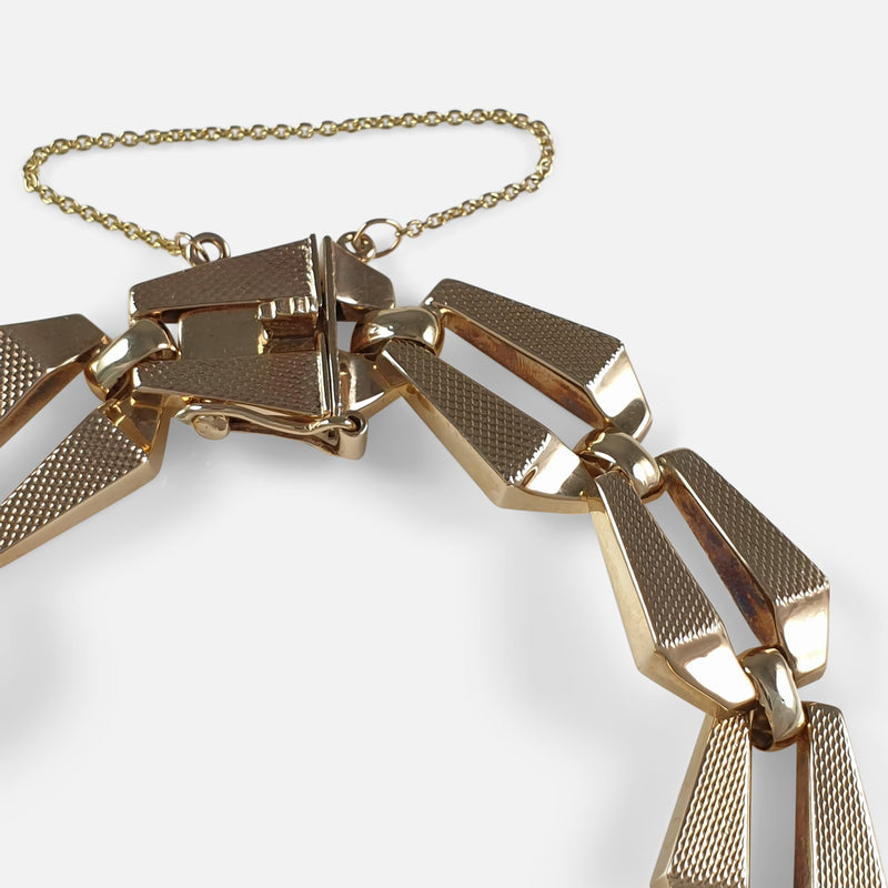 focused on a section of the bracelet links to include the clasp
