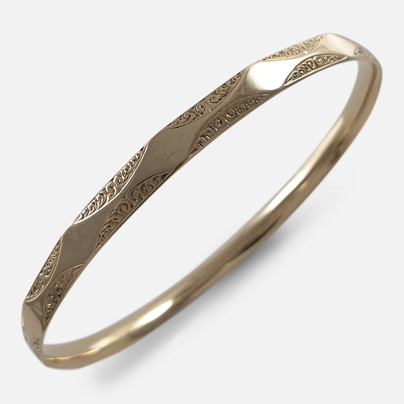 the Art Deco 9ct gold flapper bangle viewed diagonally