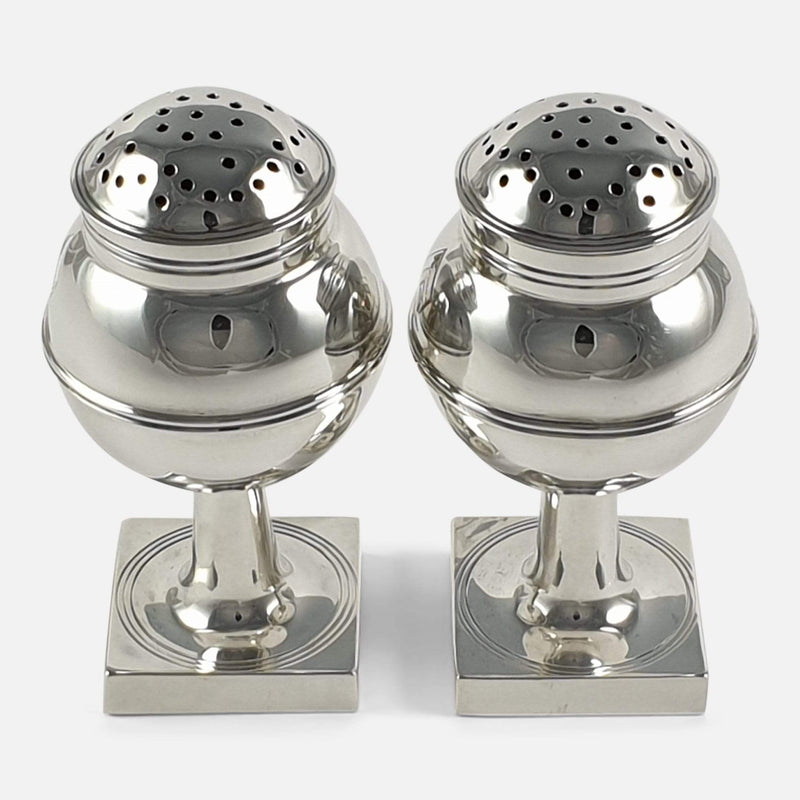 the silver pepper casters, viewed from the front