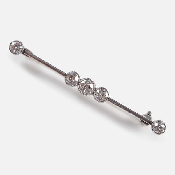 The 18 carat white gold diamond bar brooch viewed diagonally