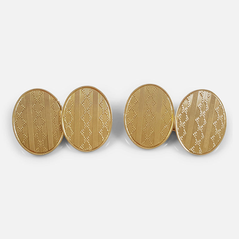 the Art Deco 18ct gold engine turned oval cufflinks viewed from the front