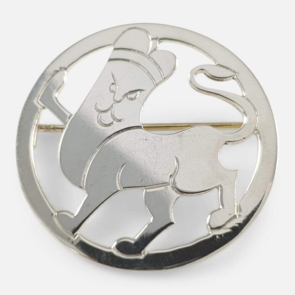 the Art Deco silver lion brooch viewed from the front