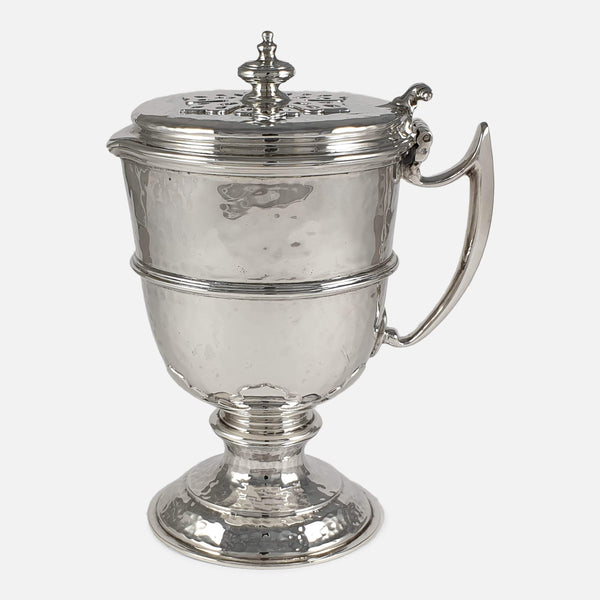 the Arts and Crafts silver ewer turned to the side