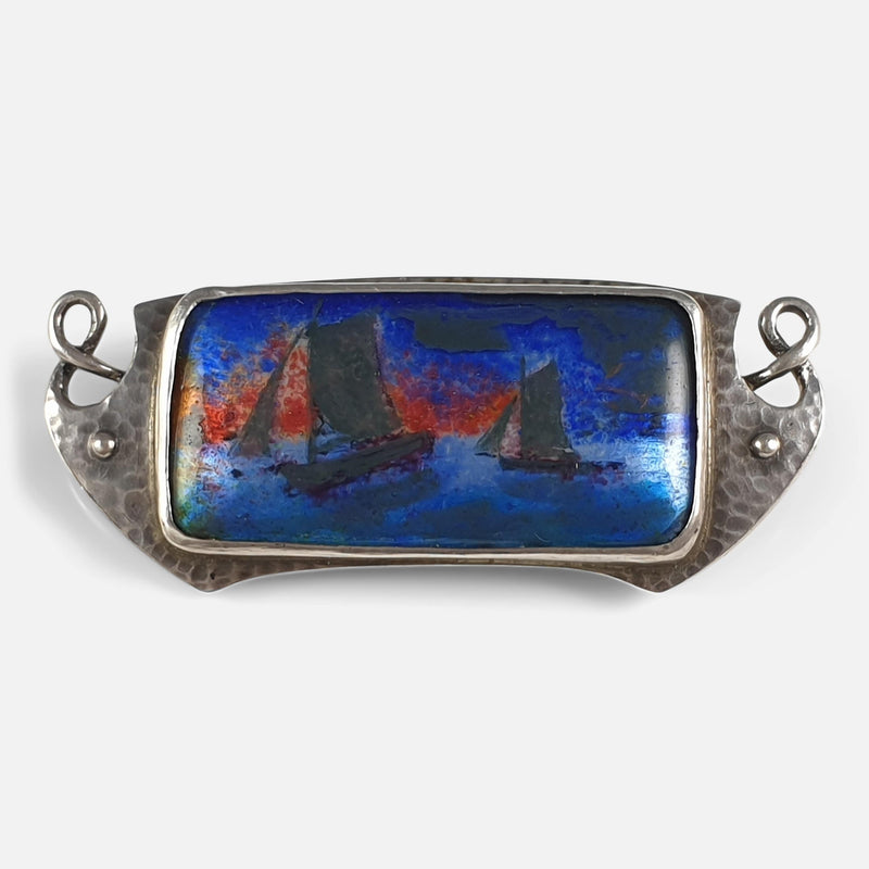 the silver and enamel brooch by Murrle Bennett & Co viewed from the front