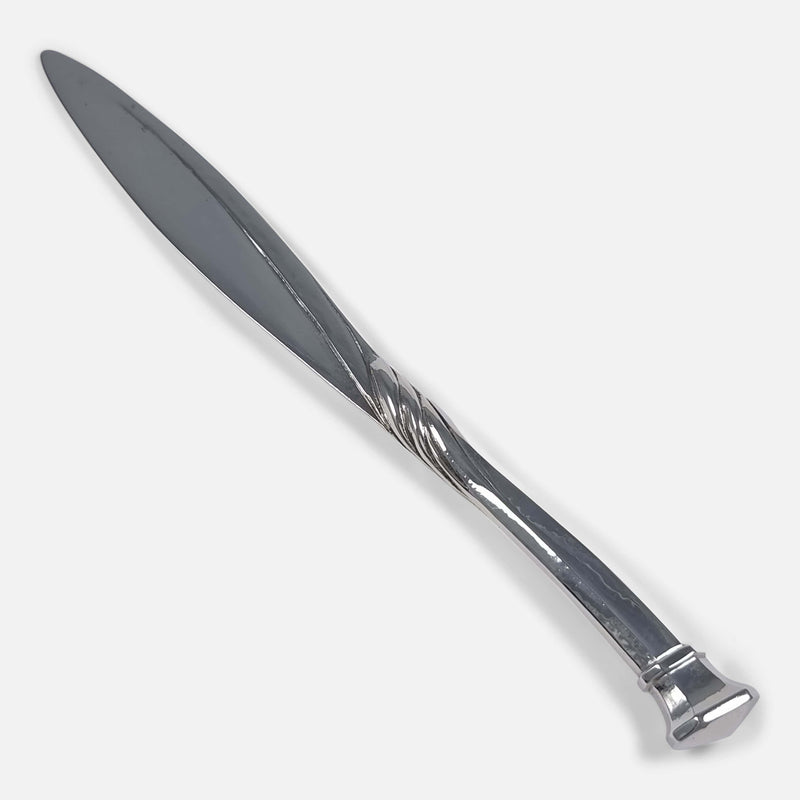 the Arts and Crafts silver paper knife by Omar Ramsden and Alwyn Carr, viewed diagonally