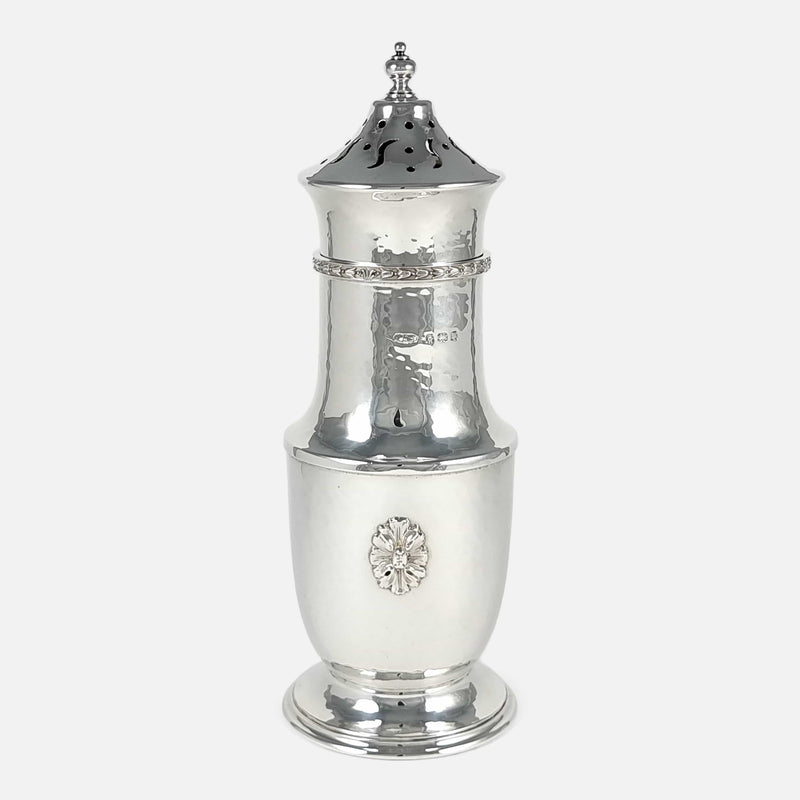 the silver sugar caster viewed from the front