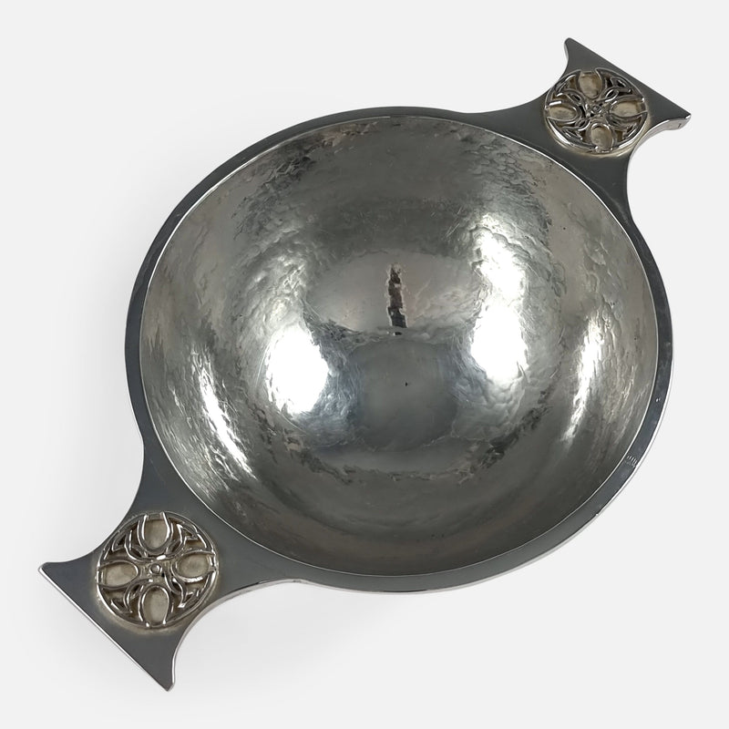 a birds eye view of the Quaich with a handle to the forefront pointing toward the left