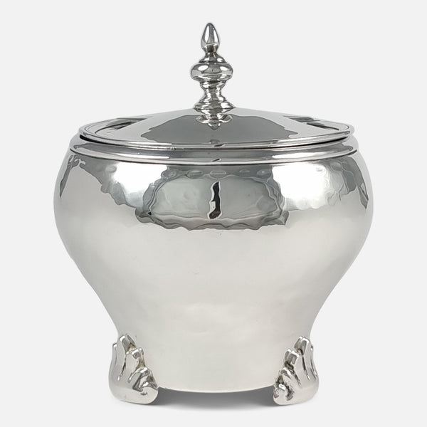 the Arts and Crafts sterling silver tea caddy viewed from the front
