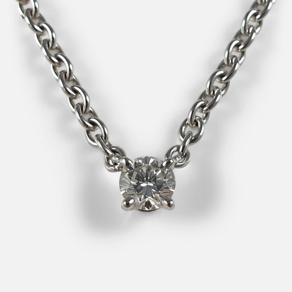 focused on the 18 carat white gold Cartier diamond solitaire necklace
