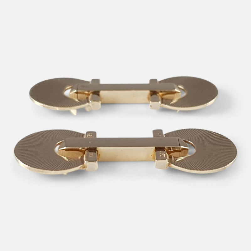 the cufflinks side on