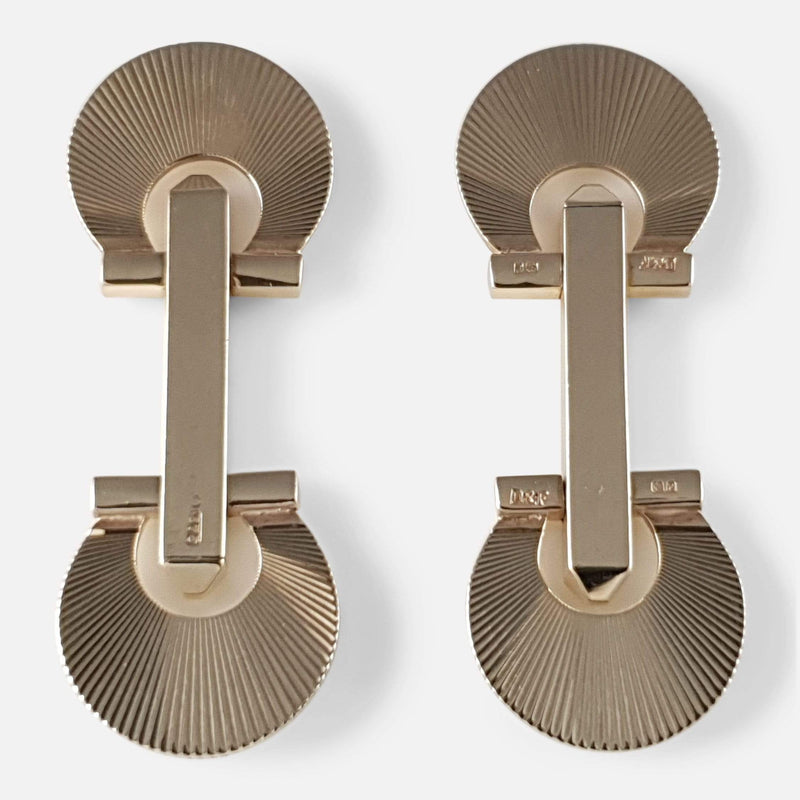 focused on the pair of cufflinks