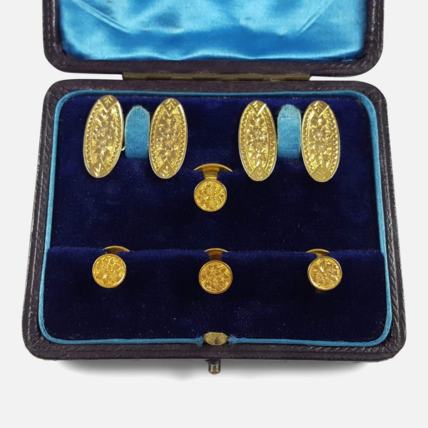 the gold set in their opened case