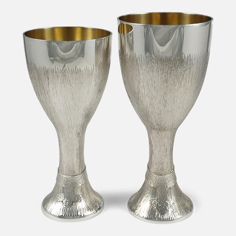 the two sterling silver cups viewed from the front