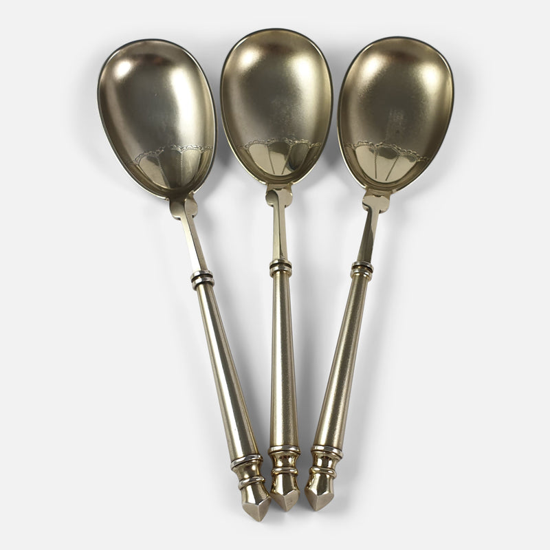a view of three of the silver spoons