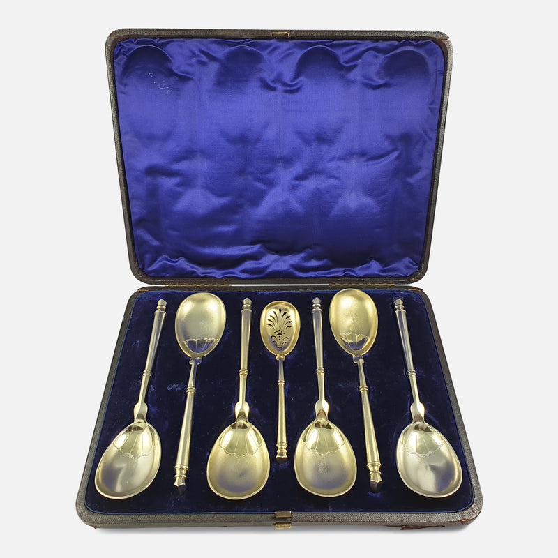 sterling silver fruit spoons and sugar sifter spoon viewed in their case