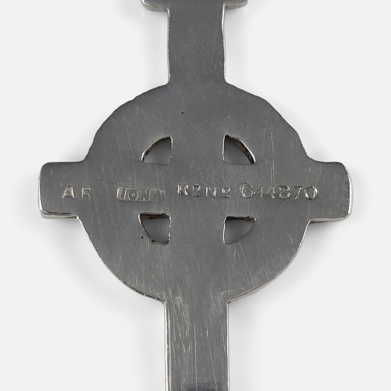 the marks to the back of the cross pendant