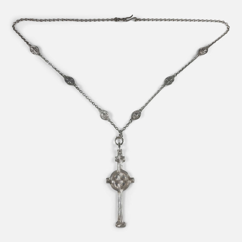 a birds eye view of the cross pendant and chain