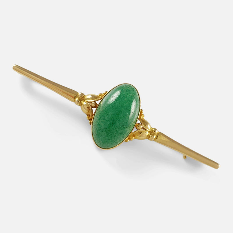 the 18ct gold and aventurine cabochon brooch viewed diagonally
