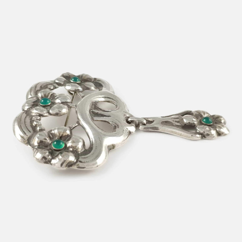 the brooch viewed from the left side on