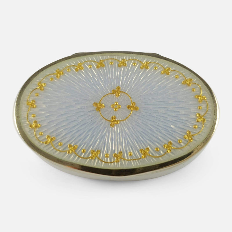 a birds eye view focused on the guilloche enamel design