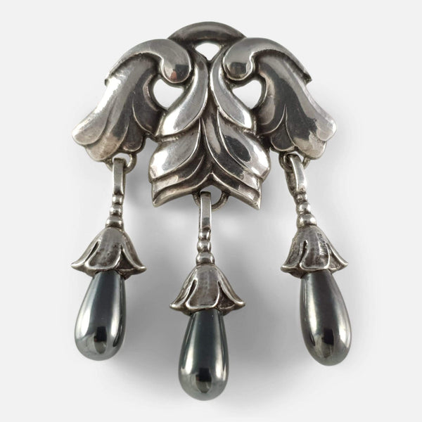 the Georg Jensen silver Hematite drop brooch viewed from the front