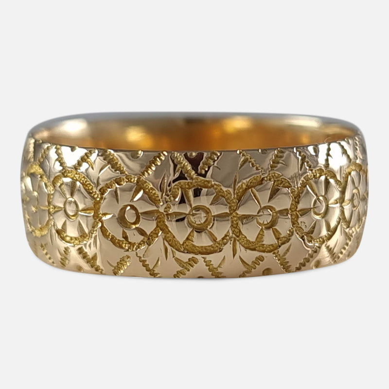 focused on the engraved decoration to the ring