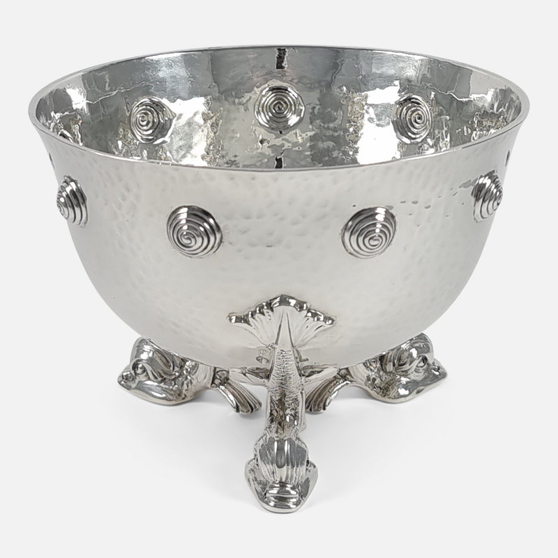 the bowl rotated with one of the mythical dolphin feet to the forefront