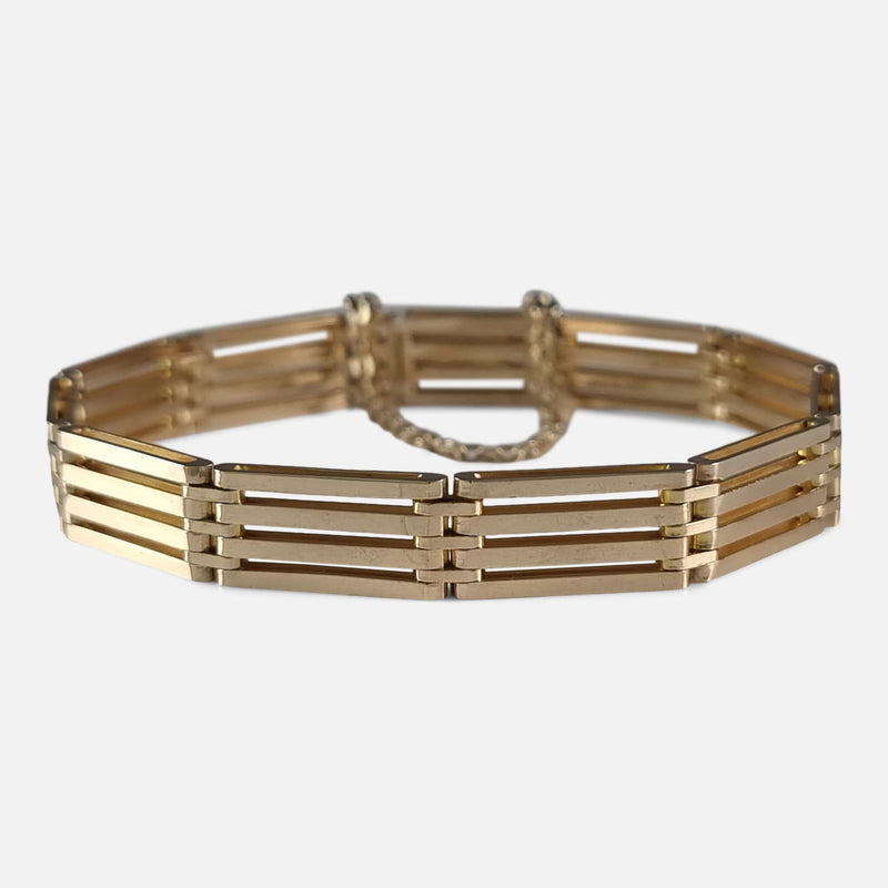 the Edwardian 15ct yellow gold gate link bracelet viewed from the front with clasp fastened