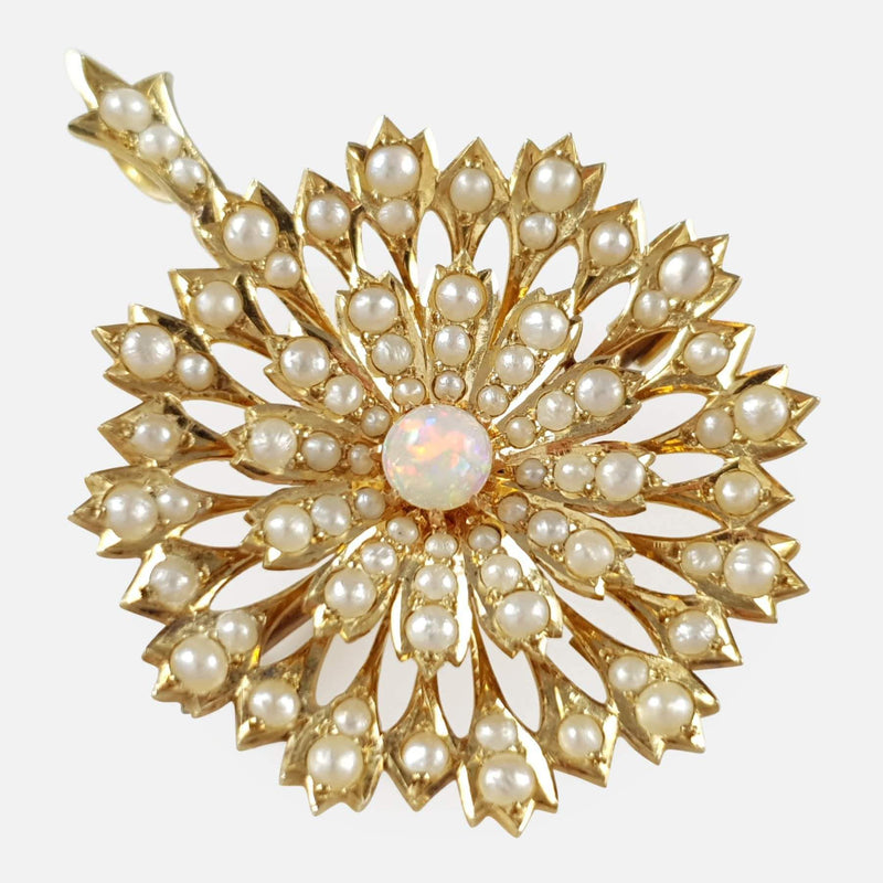 the gold pendant viewed diagonally
