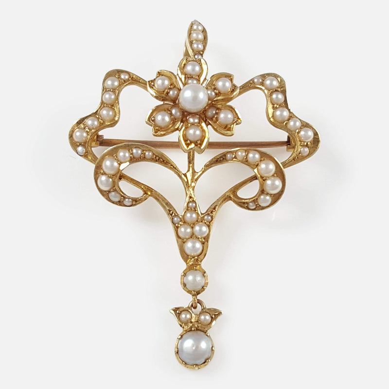 the Edwardian 15ct gold seed pearl pendant and brooch viewed from the front