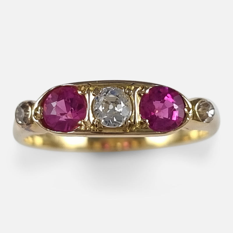the Edwardian 18 cara yellow gold diamond and pink sapphire five stone ring viewed from above