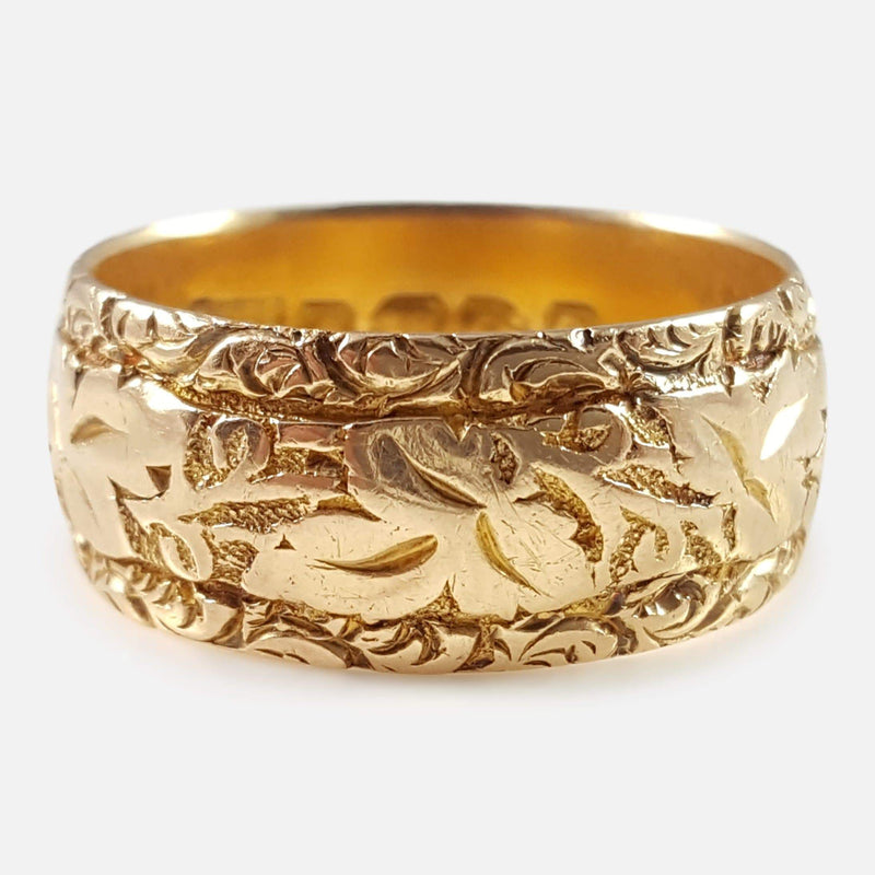the Edwardian 18ct gold foliate engraved wedding band viewed from the front