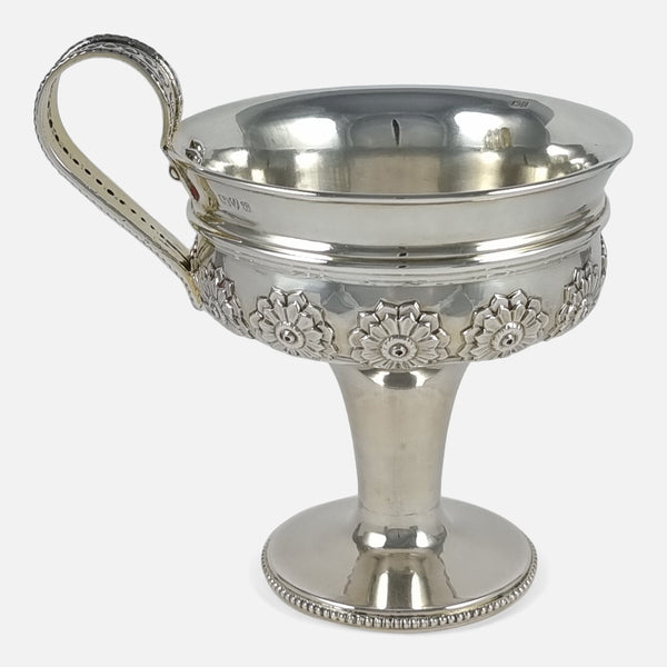 the Arts and Crafts style sterling silver pedestal cup viewed side on